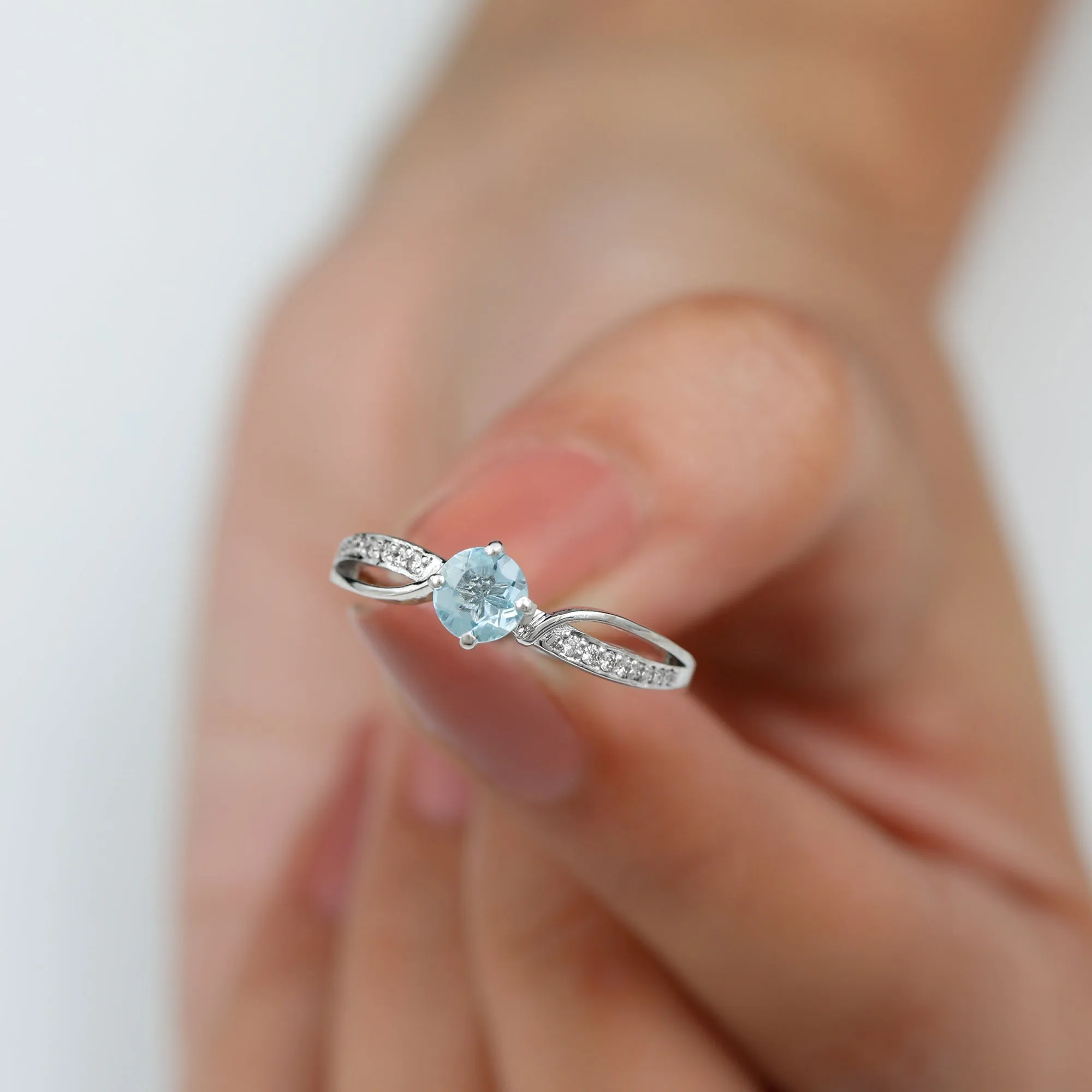 1/2 CT Two Tone Solitaire Infinity Ring with Aquamarine and Diamond