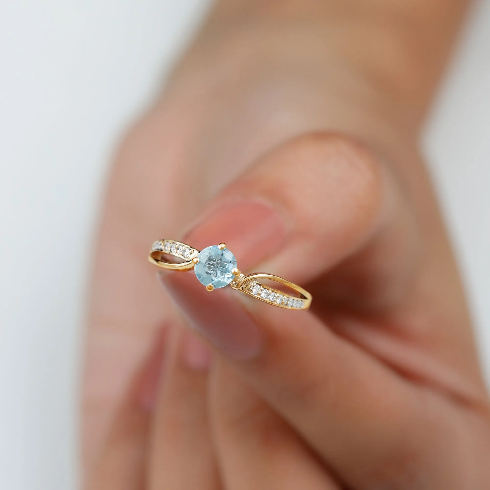1/2 CT Two Tone Solitaire Infinity Ring with Aquamarine and Diamond