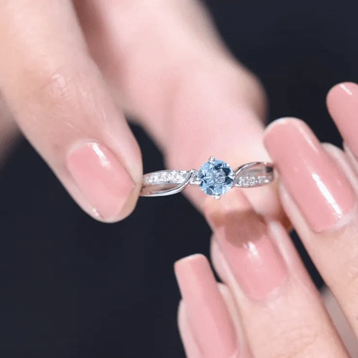 1/2 CT Two Tone Solitaire Infinity Ring with Aquamarine and Diamond