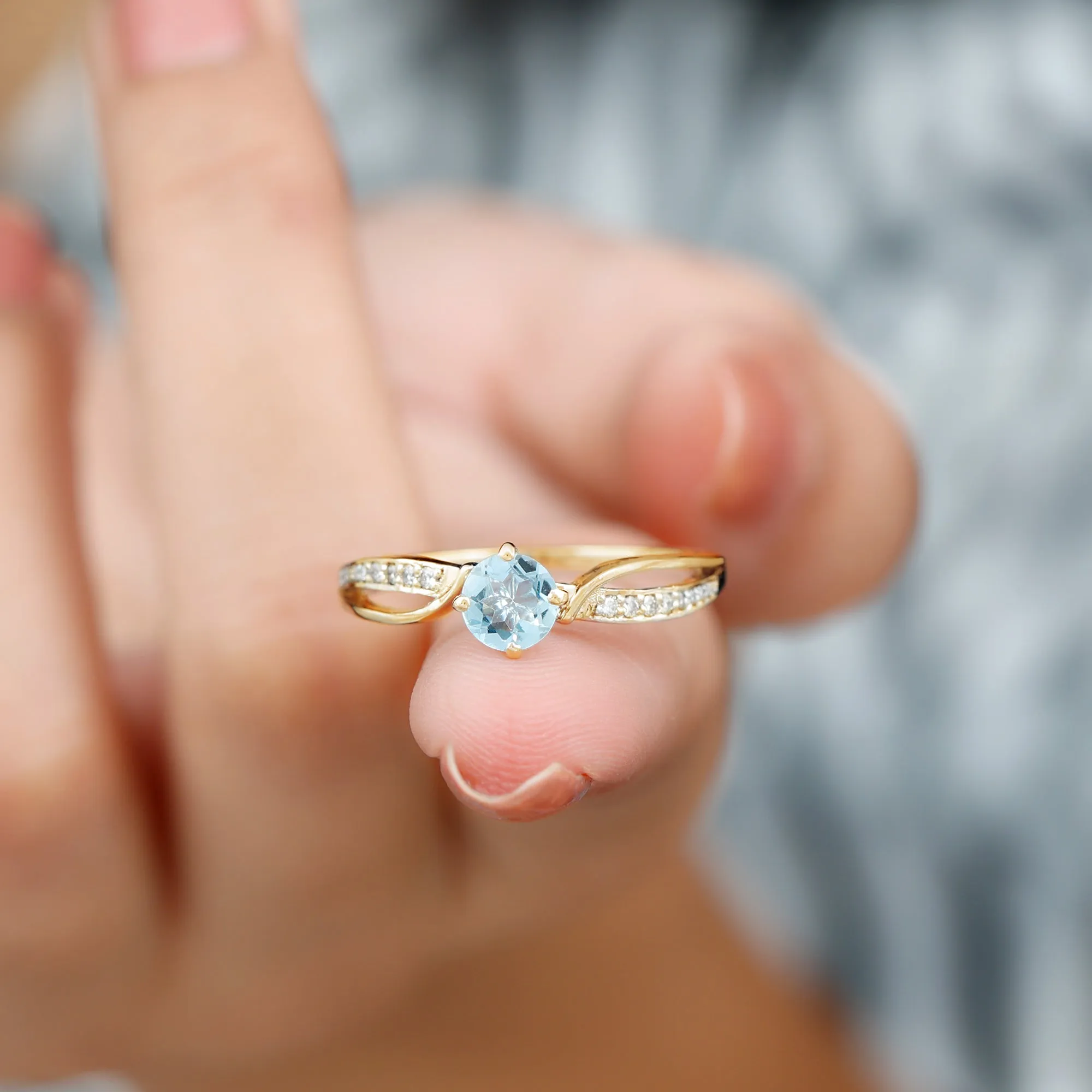 1/2 CT Two Tone Solitaire Infinity Ring with Aquamarine and Diamond
