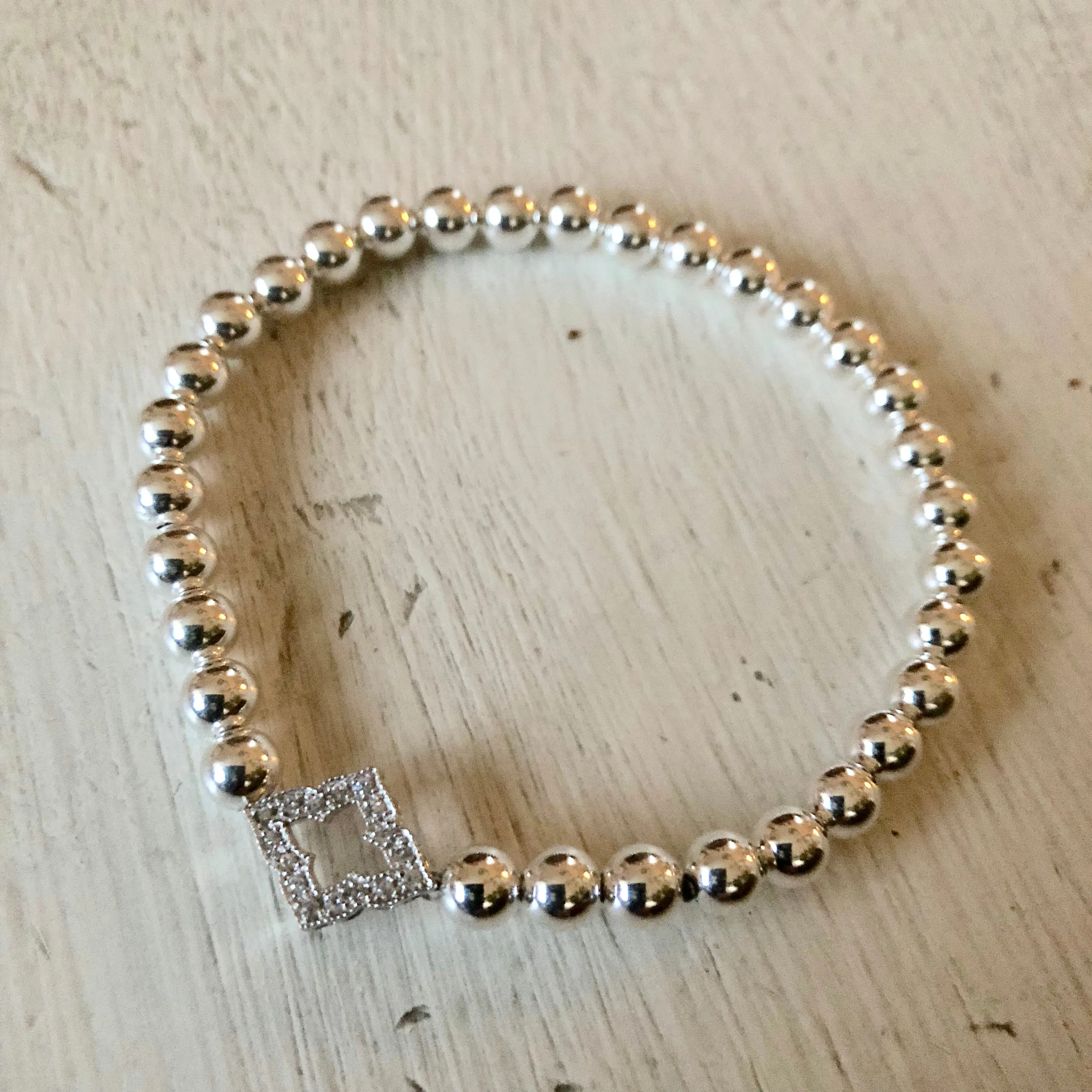 5mm Bead Stretch Bracelet with Sterling Silver/Cubic Zirconia Clover Charm