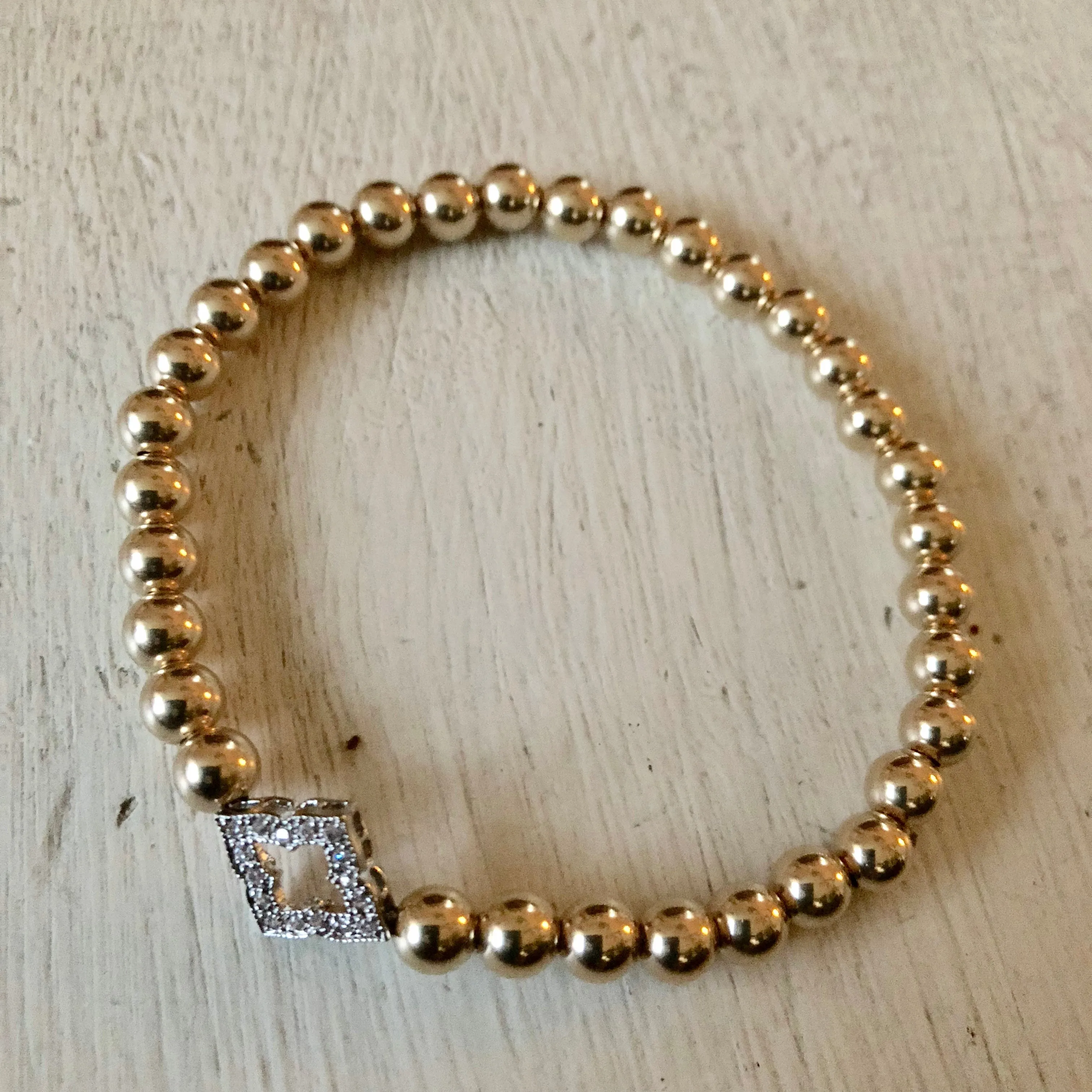 5mm Bead Stretch Bracelet with Sterling Silver/Cubic Zirconia Clover Charm