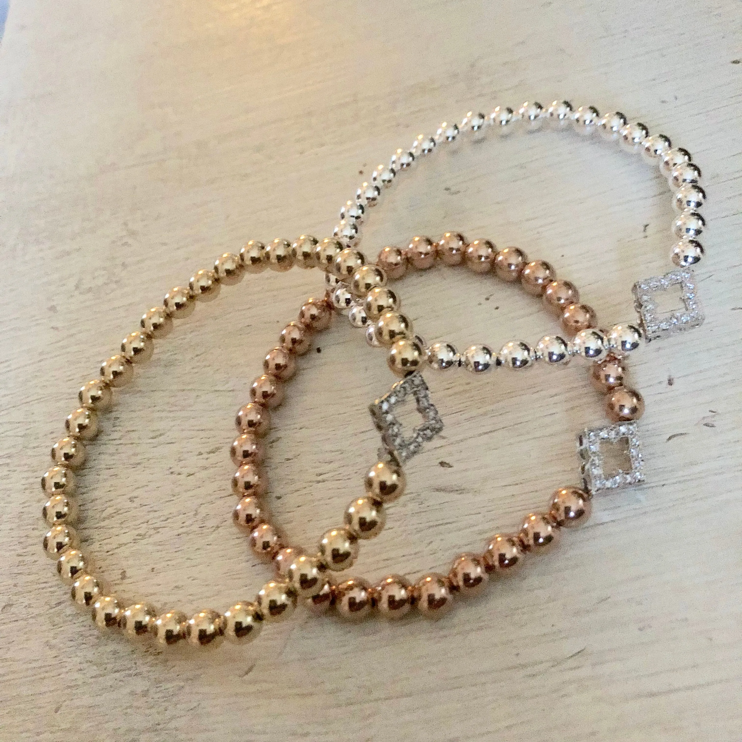 5mm Bead Stretch Bracelet with Sterling Silver/Cubic Zirconia Clover Charm