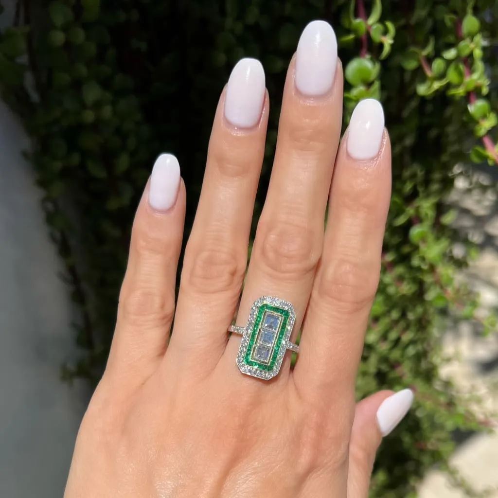 Estate Platinum Ring with French Cut Diamonds and Emeralds at Regard Jewelry in Austin, Texas