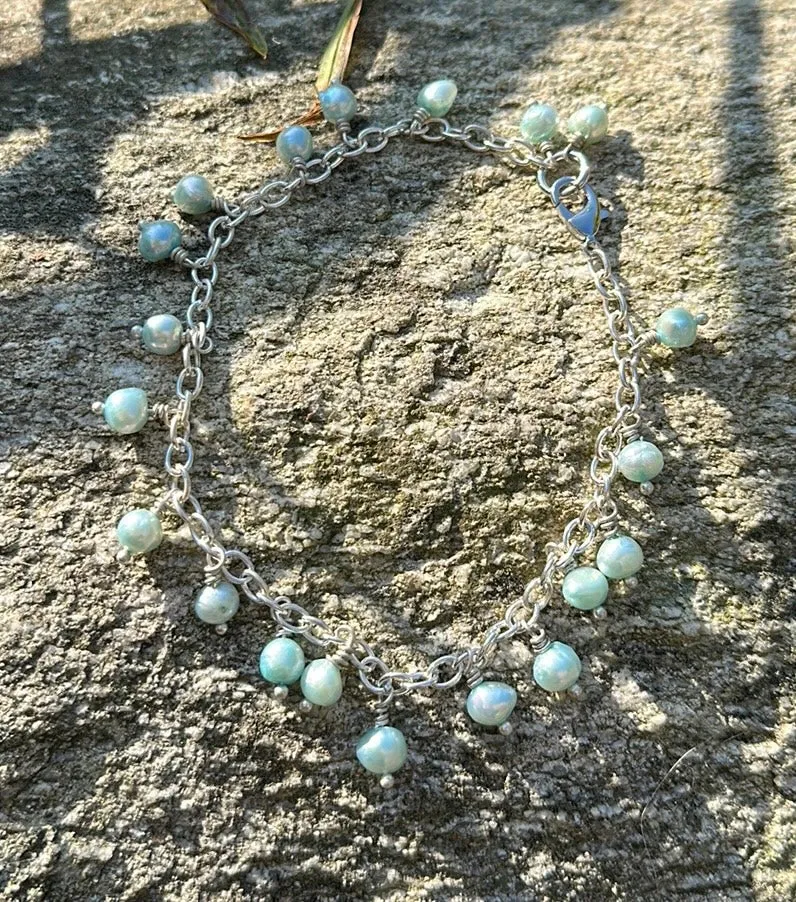 Minty blue pearl charm bracelet