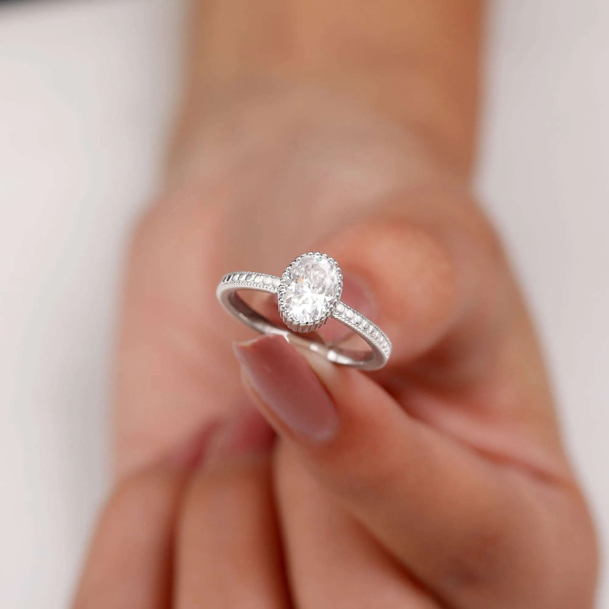 Oval Shape Moissanite Solitaire Engagement Ring with Beaded Detailing