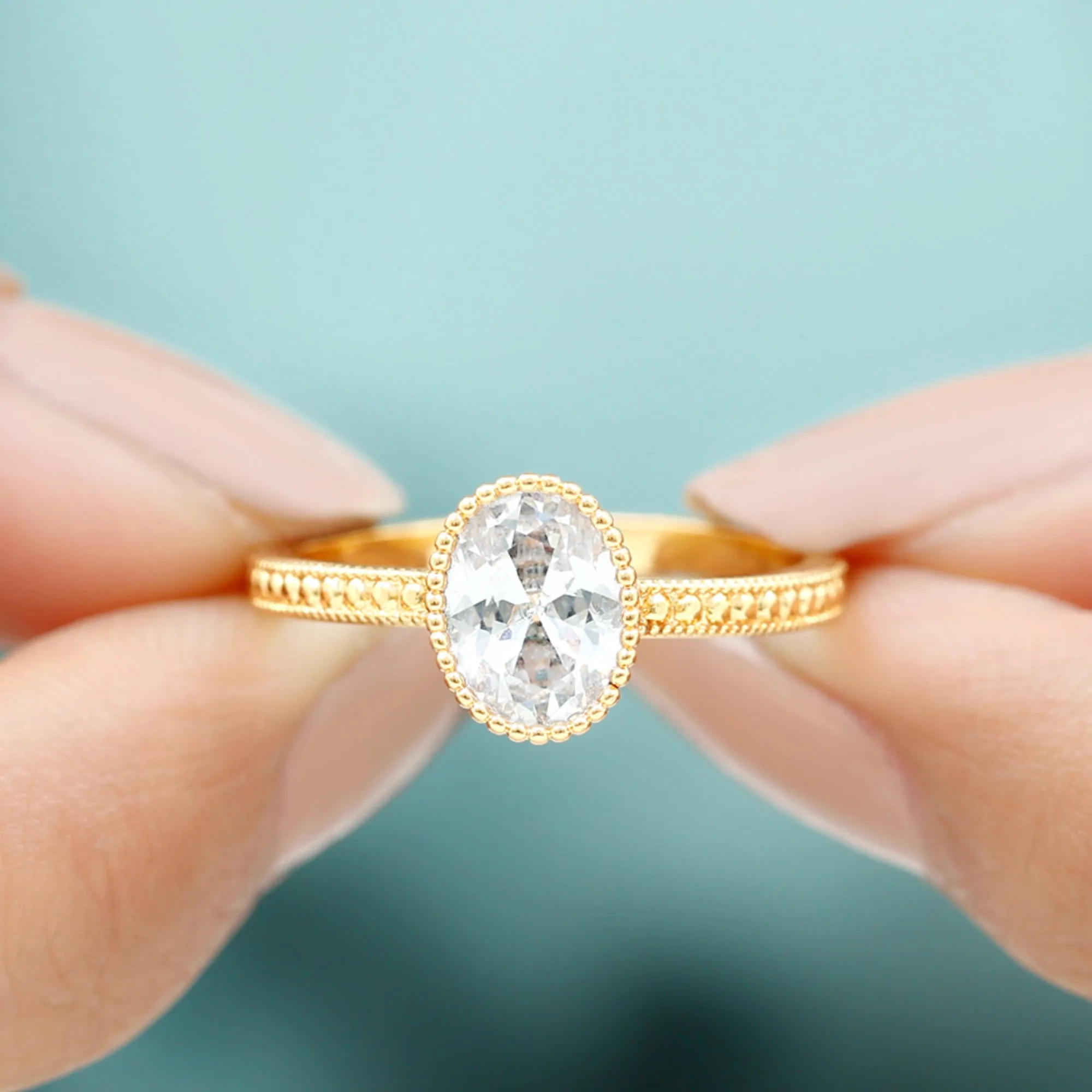 Oval Shape Moissanite Solitaire Engagement Ring with Beaded Detailing